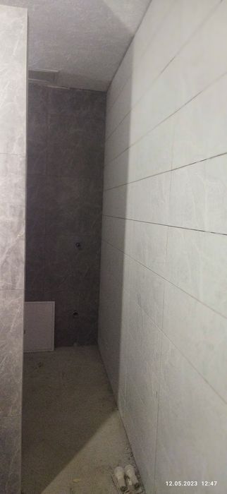 Укладка керамічної плитки,ламінат,шпаклівка стін .