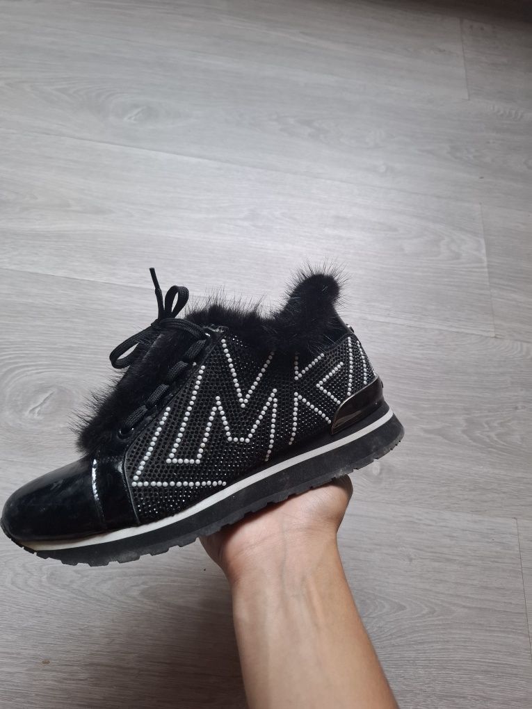 Женские кроссовки Michael Kors