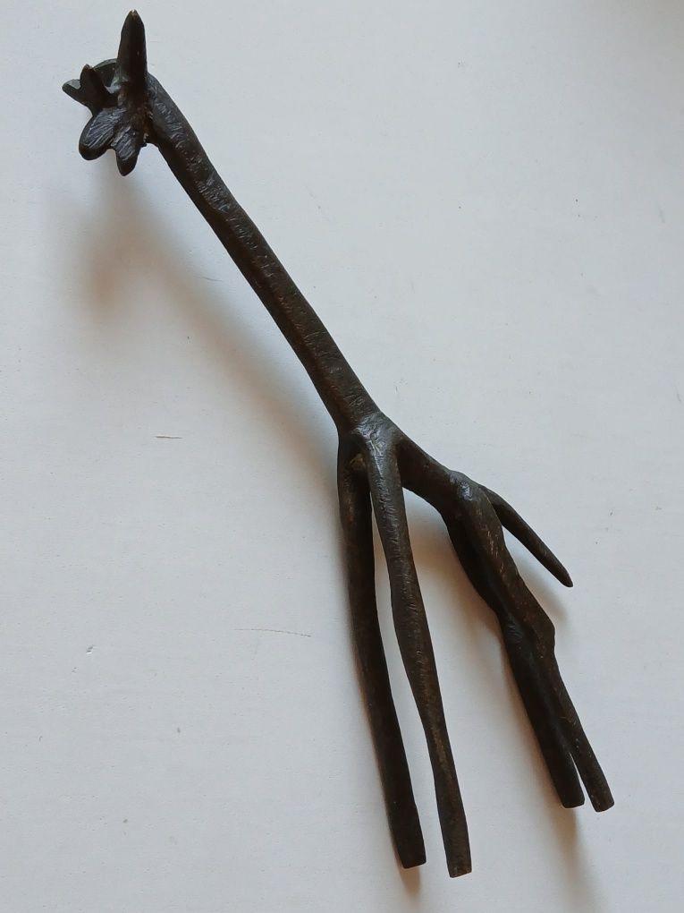 Girafa antiga em metal
