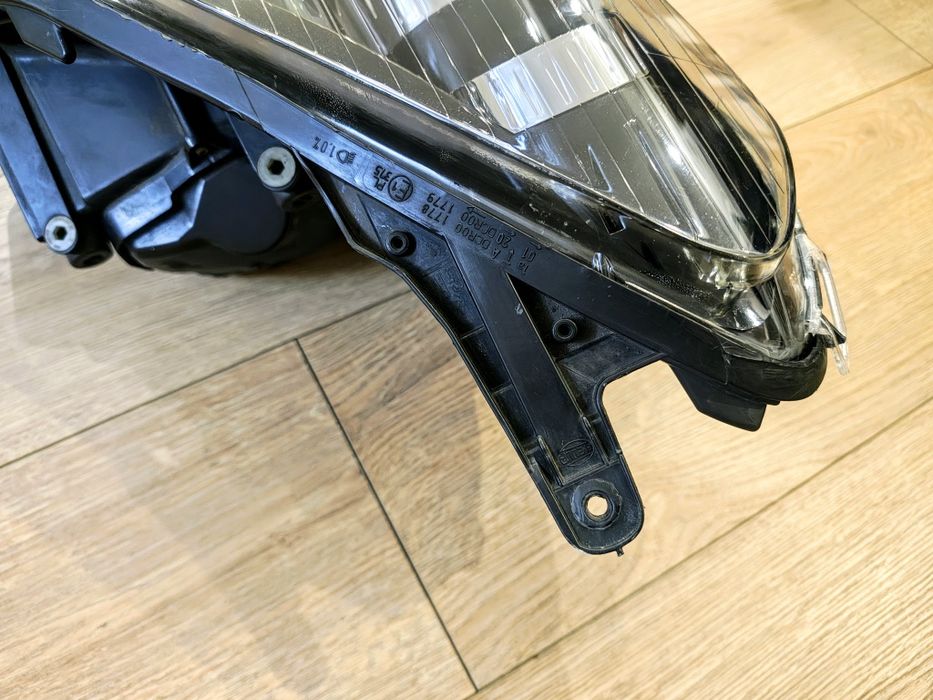 Reflektor lampa przód prawa opel astra h 3 III bixenon skrętny eu