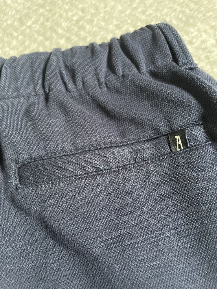 Granatowe spodnie zara 164