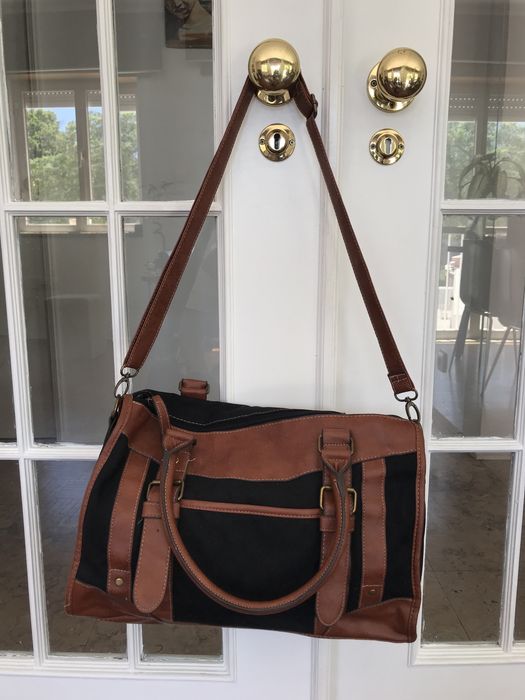 Mala vintage preta e castanha