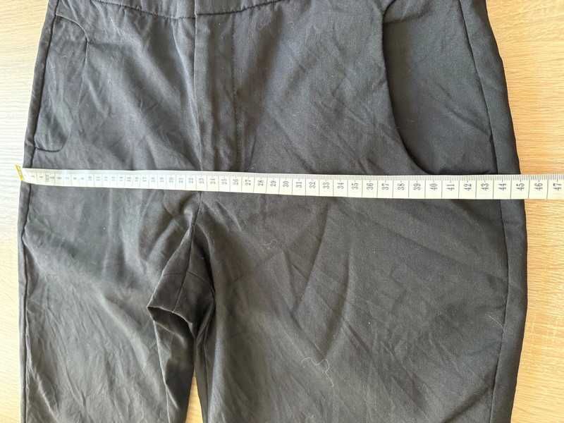 Eleganckie czarne spodnie Filippa K, rozmiar XS