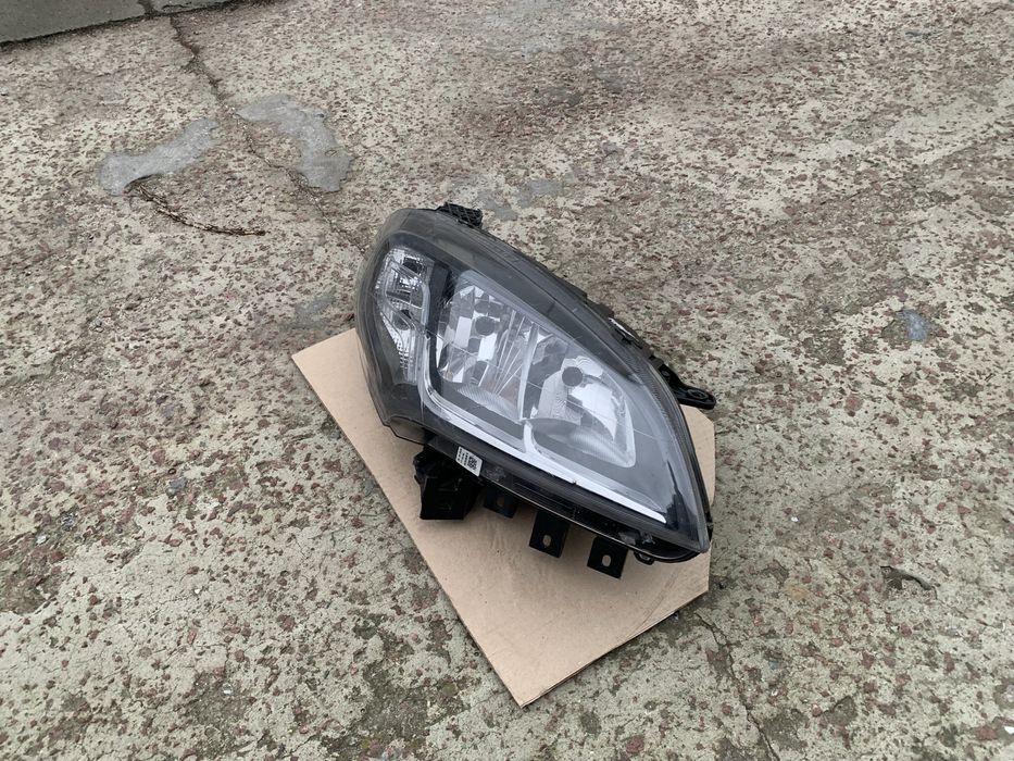 Права фара Fiat Doblo оригінал чорна фіат добло