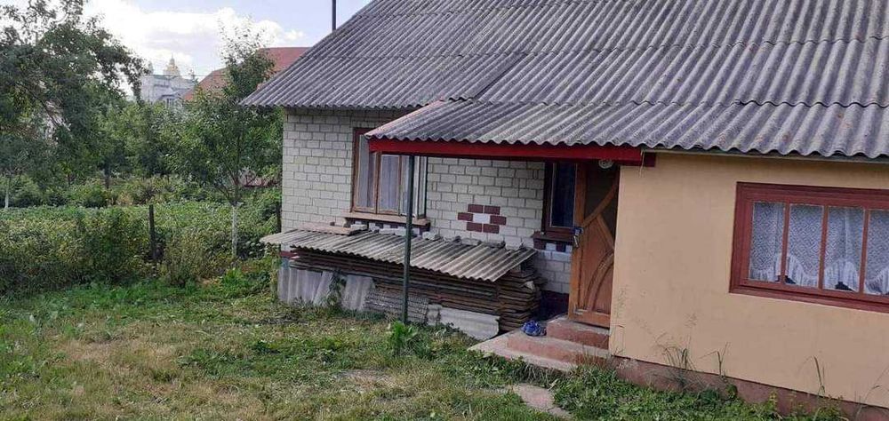 Времянка + незавершене будівництво.