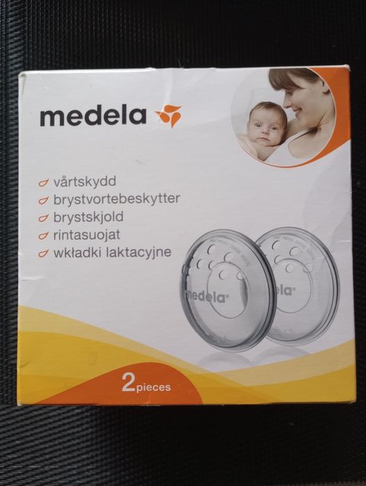 Medela laktator ręczny, wkładki latacyjne, woreczki + butelka