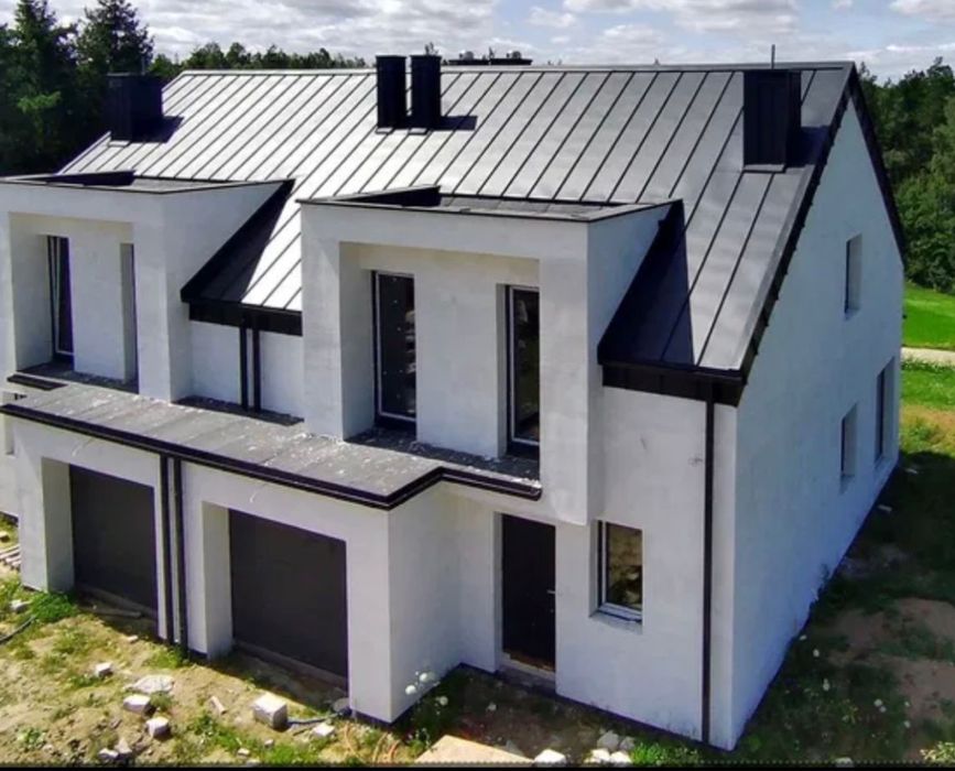 Dom w klematisach 27B