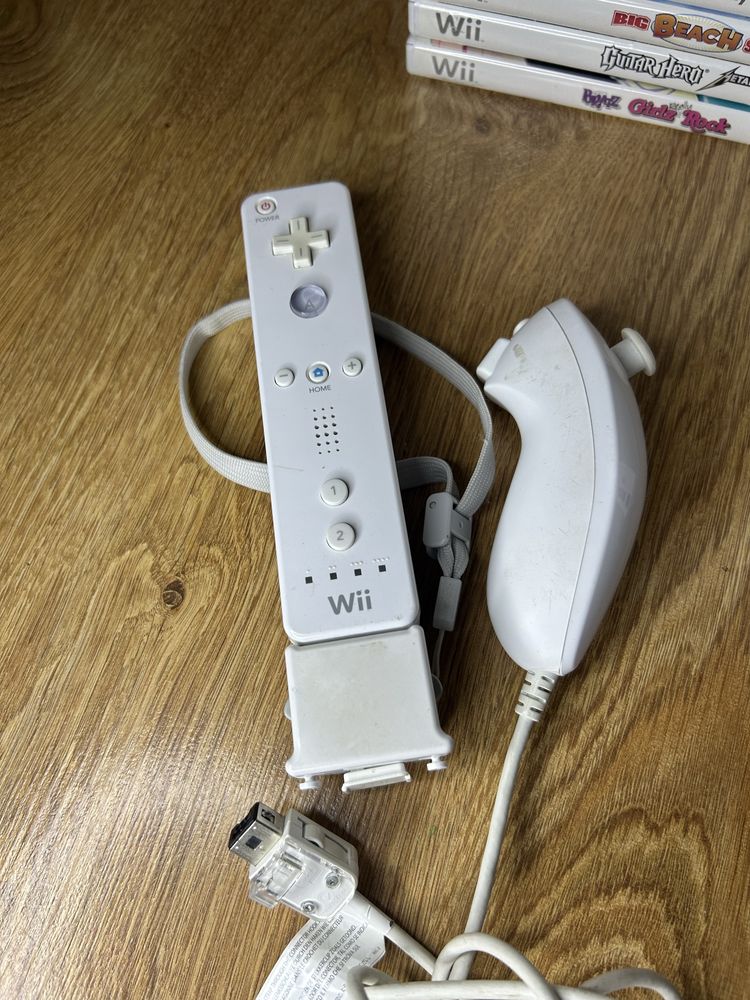 Konsola Wii + kontrolery + gry