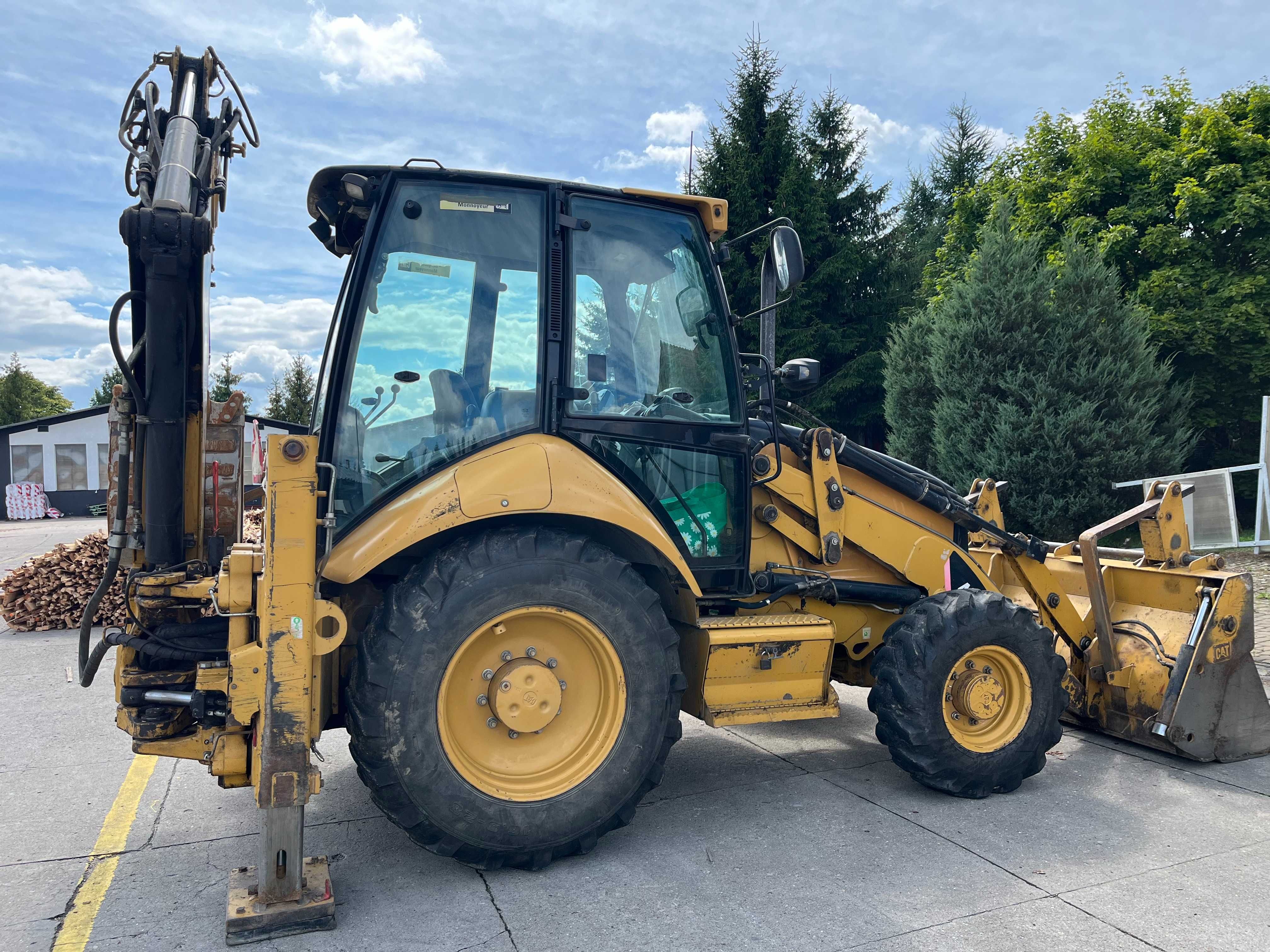 Koparko-ładowarka CATERPILLAR 428E/94KM-dodatkowo młot