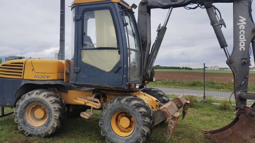 Mecalac 12mxt 2002.