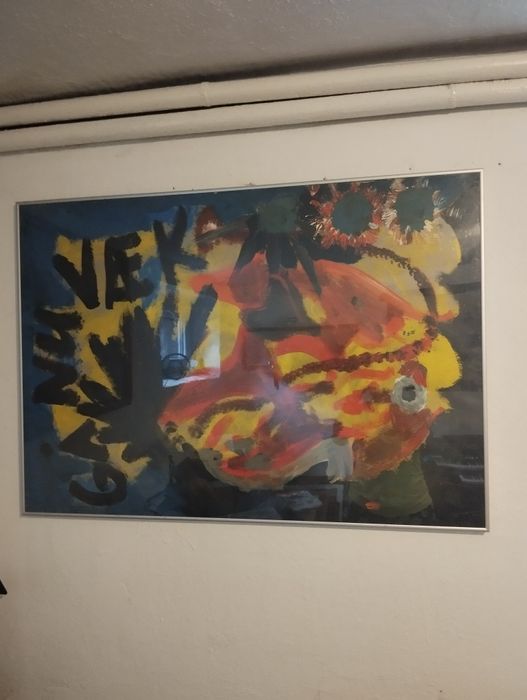 Obraz malowany  przedstawiający letni pejzaż w srebrnej eazkiej ramce