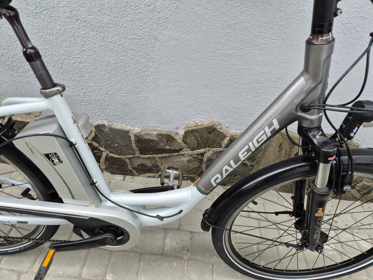 Електровелосипед дамка бу з Європи алюмінієвий гідравліка Raleigh 26 A