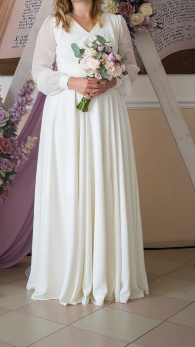 Елегантна весільна сукня