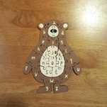 Drewniane puzzle układanka Miś z alfabetem.
