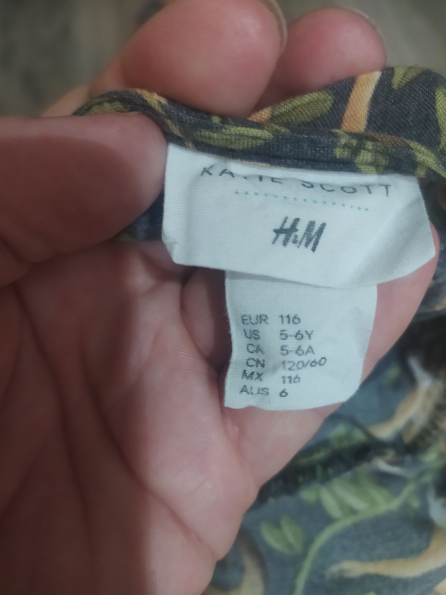 Kombinezon z falbankami rozmiar 116 H&M