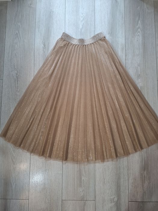 Śliczna damska plisowana spódnica w kolorze złotym