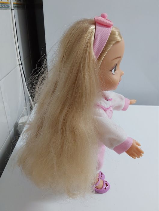 BONECA BONITA da DISNEY com a canção (Eu vejo a luz) da disney.8 fotos