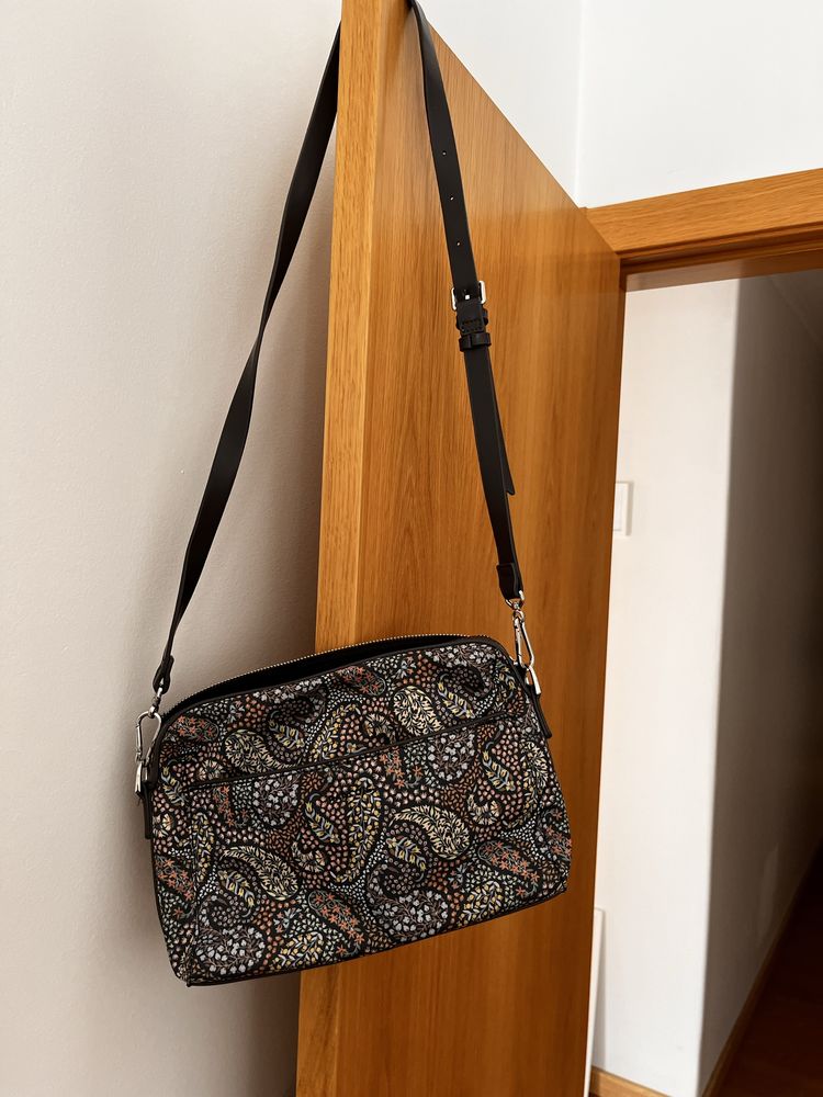 Mala tiracolo com bolso exterior