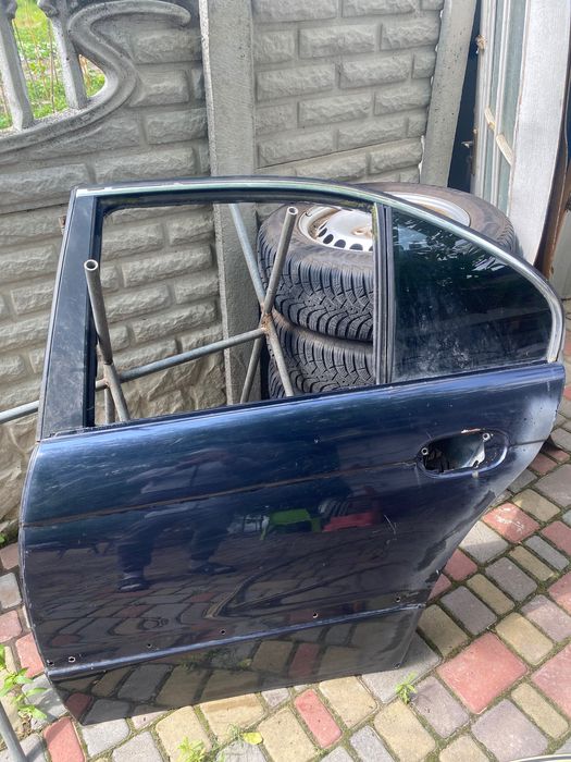 Дверь BMW e39 задня ліва