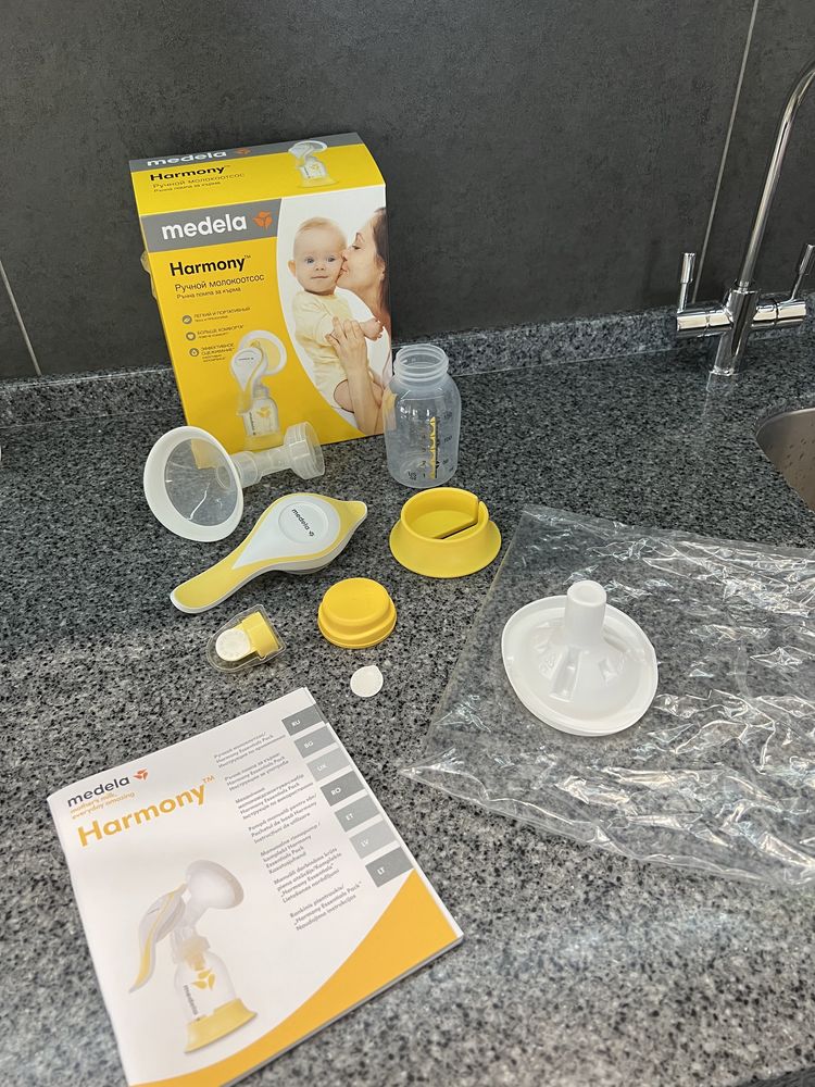 Продам молокоотсос Medela Harmony - новый