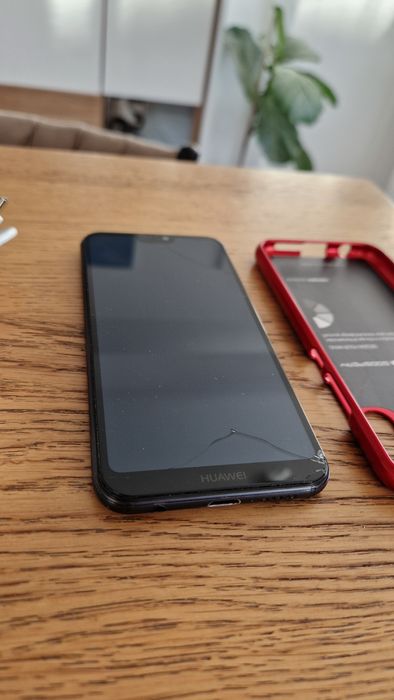 Huawei P20 Lite + etui + oryginalna ładowarka