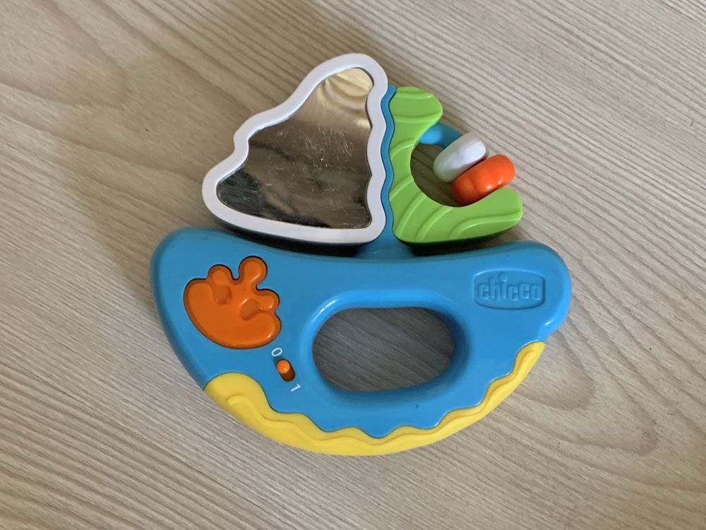 Іграшки брязкальца музичні для малюка line та човник, chicco