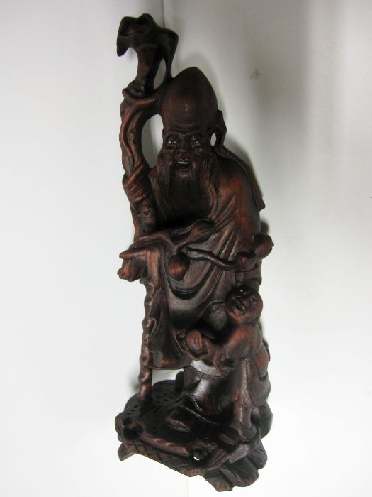 antiga figura asiática de um Homem Sábio - esculpido em madeira