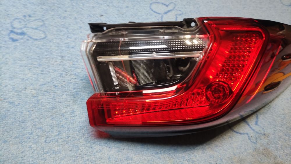 Lampa tylna lewa Toyota Corolla E21 18-23