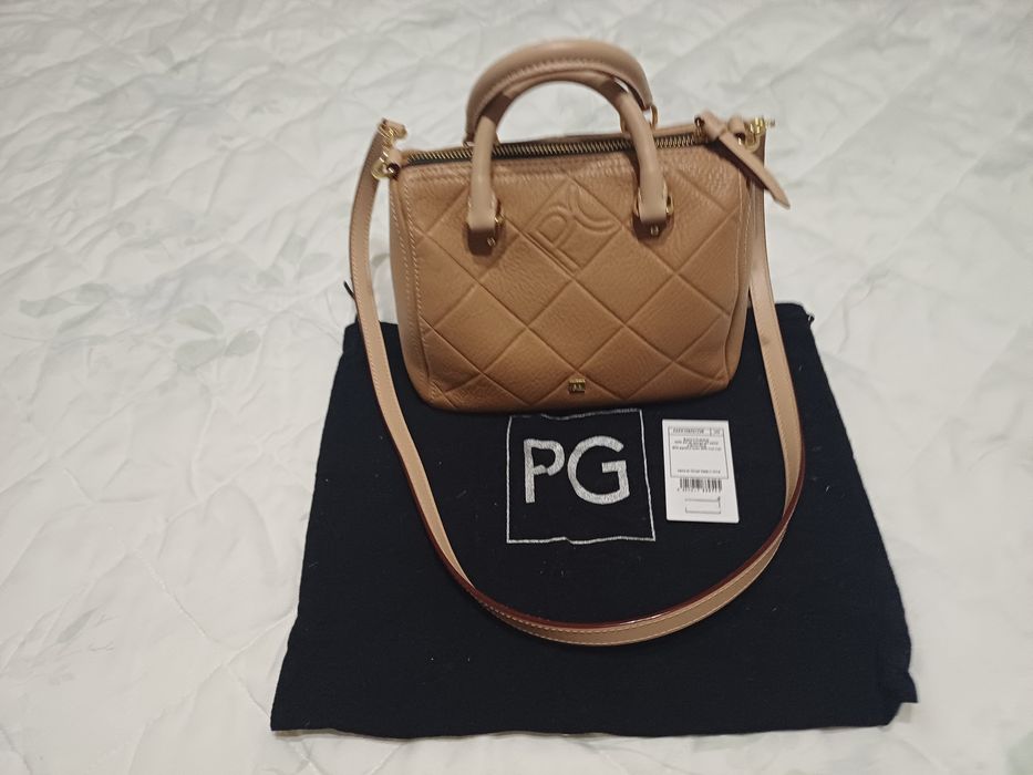 Mala, carteira nova Purificación García