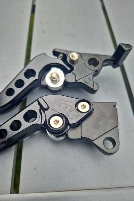 Рычаги мотоцикла, курки тормоза и сцепления, универсальные ручки