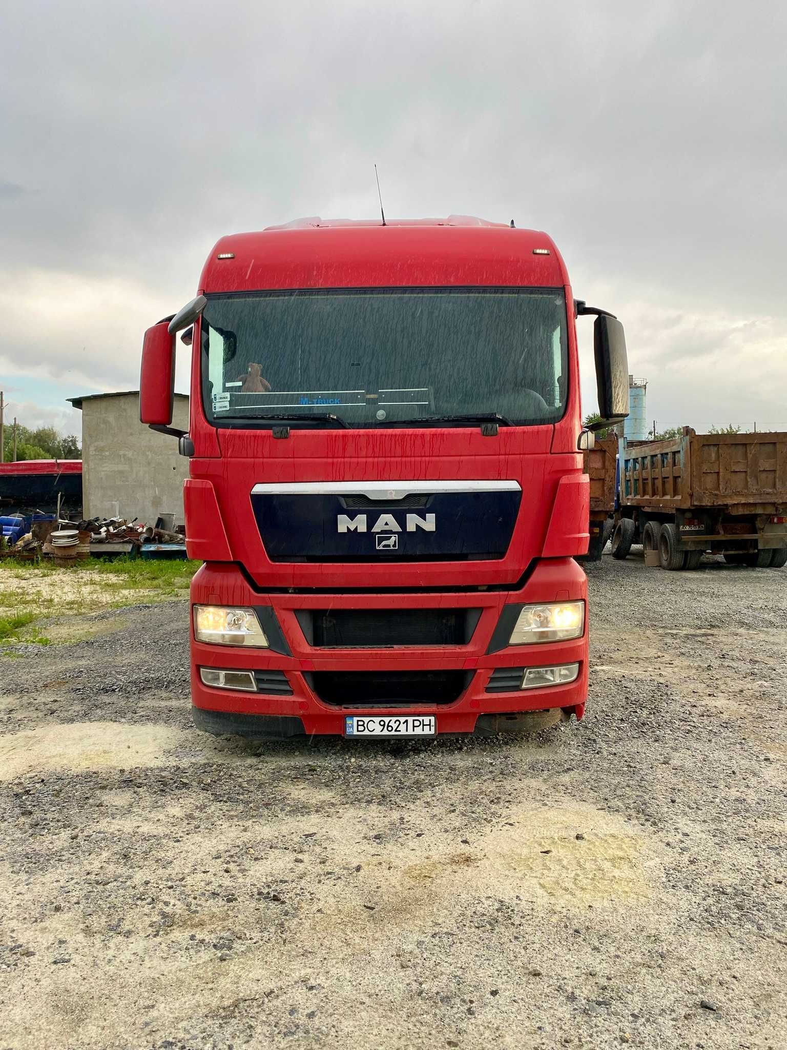 MAN TGX 2011, причіп Schmitz 2005
