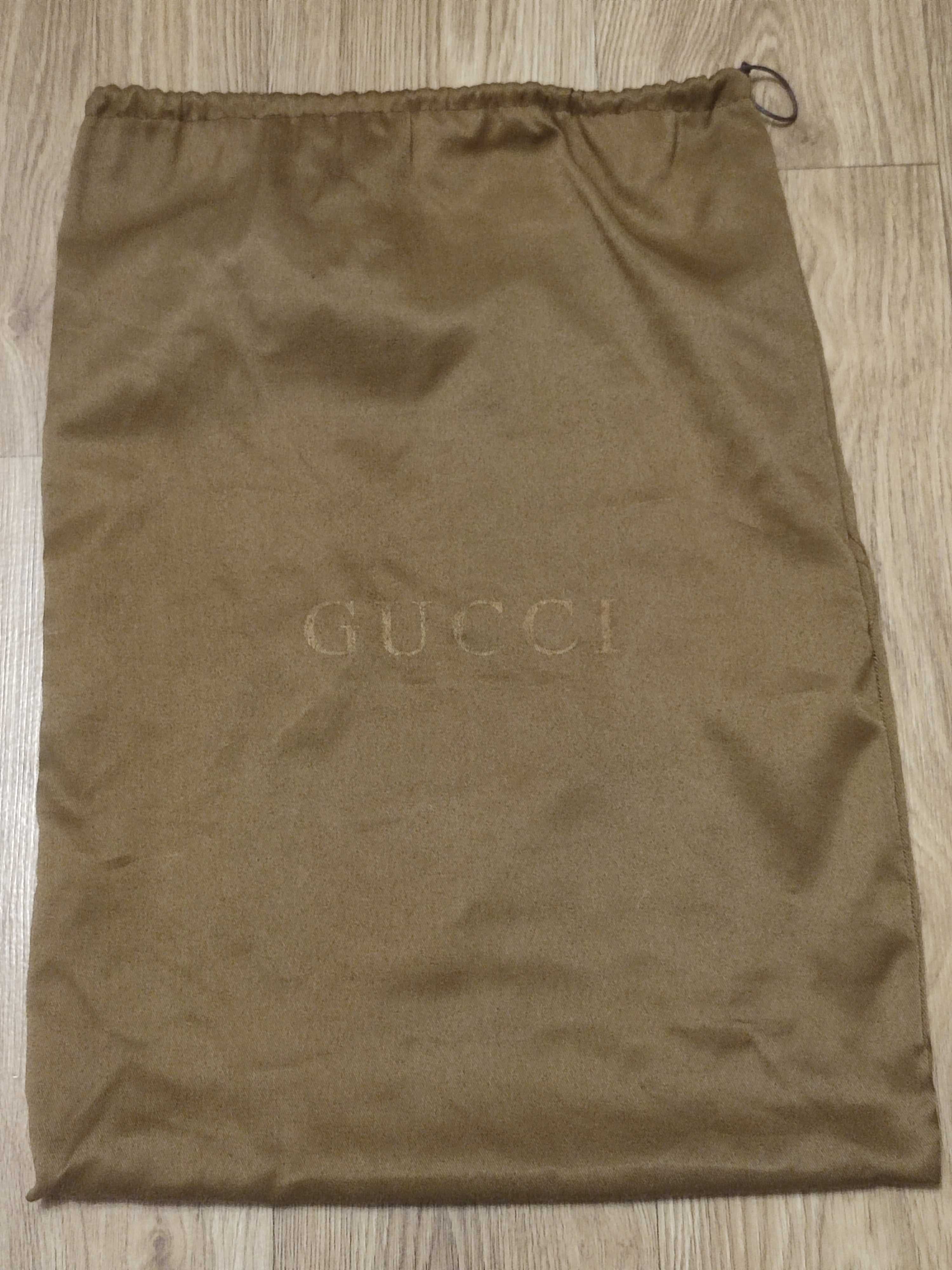 Пильник фірми Gucci