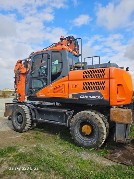 Doosan DX140  Piekny Doosan DX140. Głowica rototilt 3 łyżki