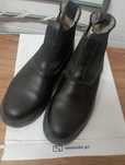 Botim preto de montar