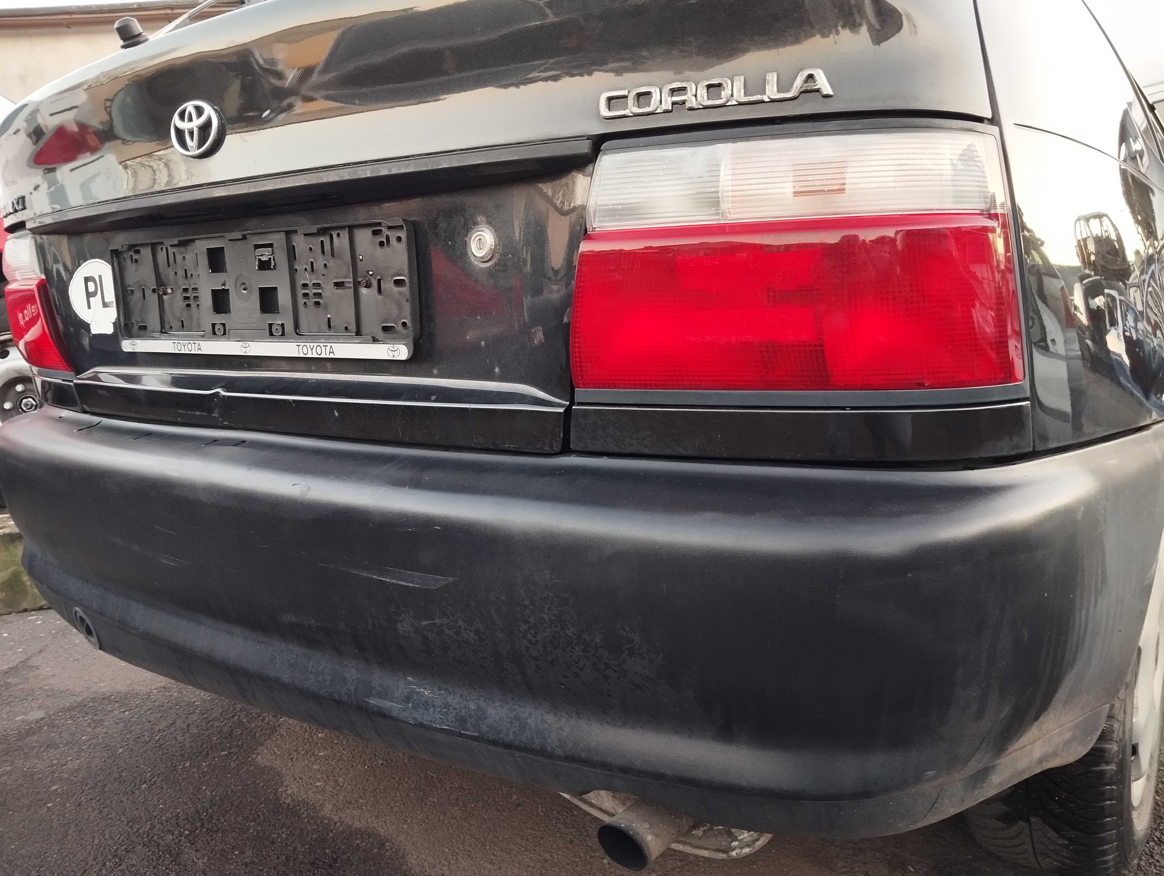 Toyota Corolla AE100 1.4i 3D 1996r.Zderzak tylny.