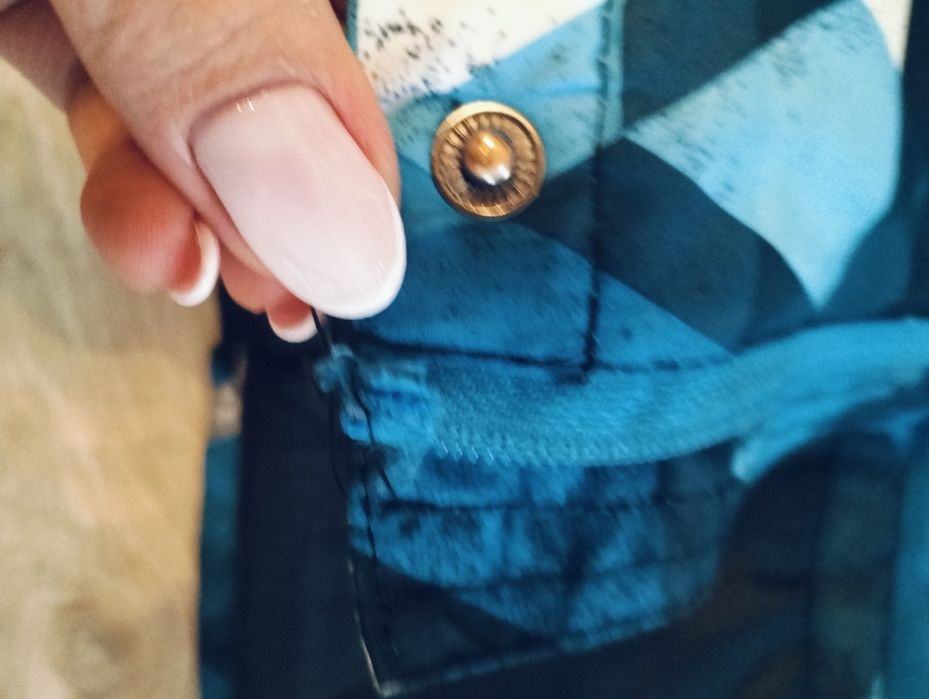 Kurtka zimowa dla chłopca Reporter r.140 uszkodzona