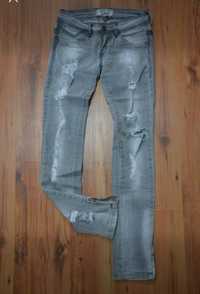 Bershka rurki jeansy z dziurami rozm. Xs