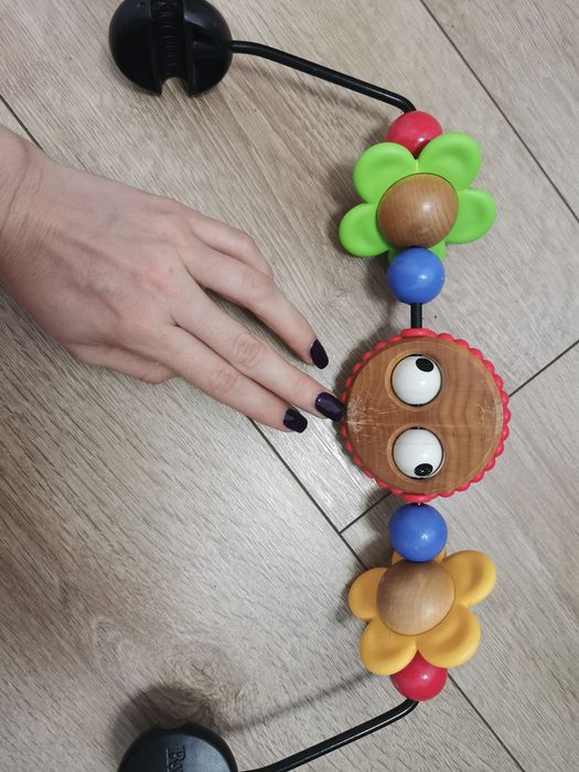 BabyBjorn Googly Eyes szalone oczy pałąk zabawka do bujaczek lezaczek