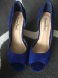 Buty na wysokim koturnie 38
