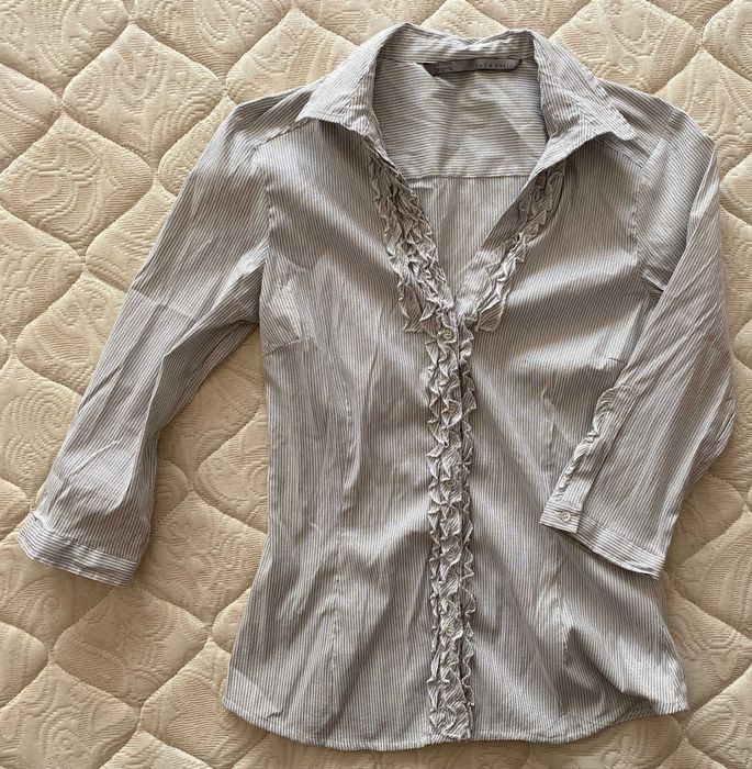 Blusa brilhante de manga 3/4 da Zara