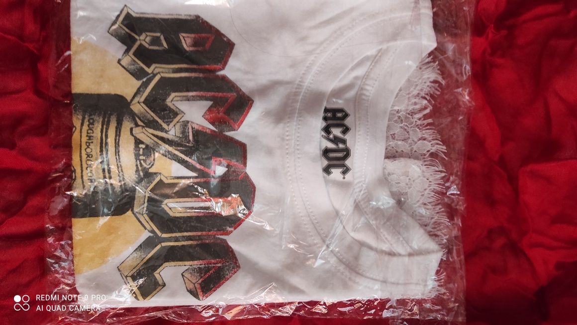 Bluzka dziewczęca sygnowana znakiem zespołu AC/DC biała 7/8 lat
