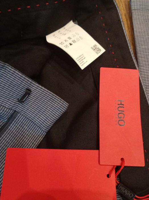 Hugo Boss garnitur męski niebieski elegancka jednorzędowy rozmiar 54