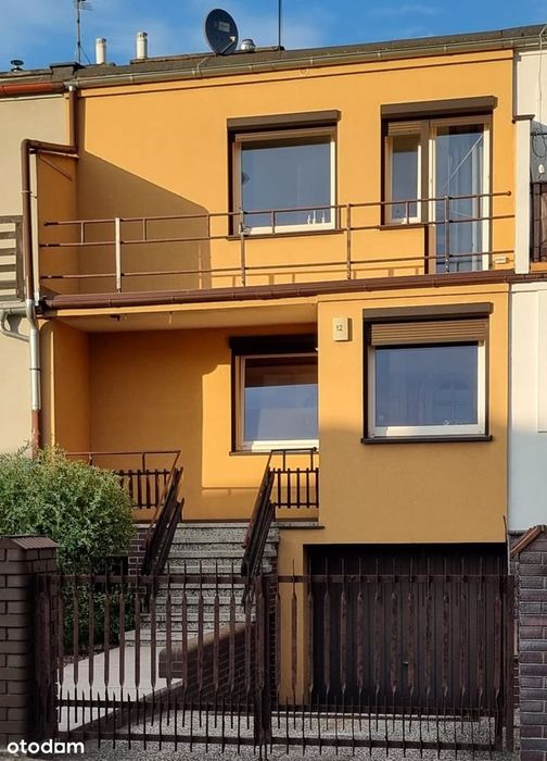 Dom z garażem i ogrodem  – Idealny dla rodziny lub działalności!