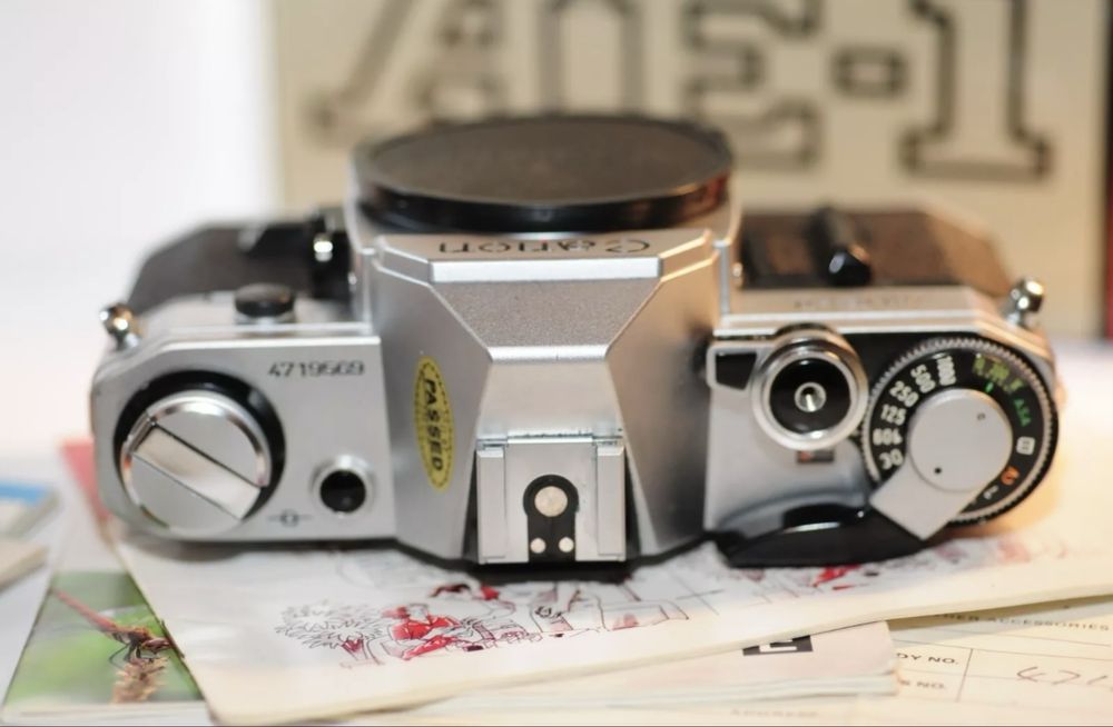 Canon Ae-1 c/ Caixa Original - 100% funcional + Documentos e Manuais