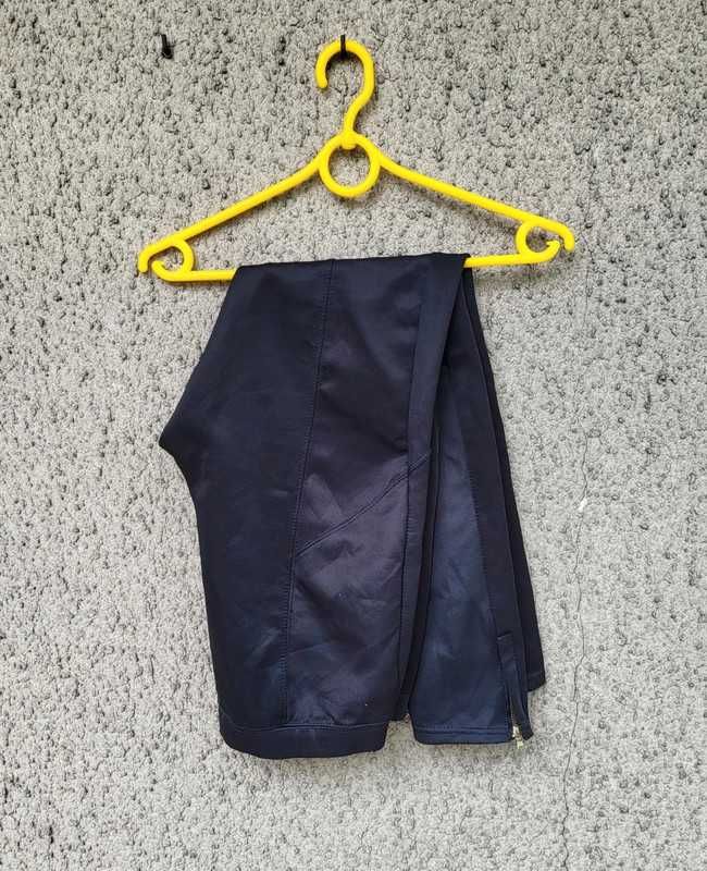 Czarne legginsy getry sportowe