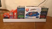 Camiao com 12 carrinhos carros