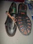 Sapatos em pele novos