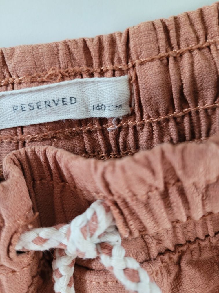 Spodnie Reserved 140 jak nowe