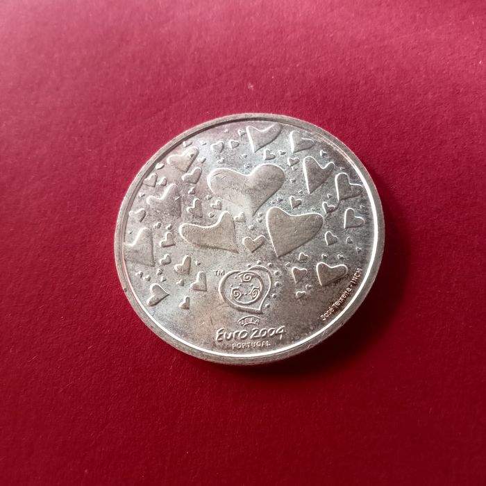 moeda prata 8.00 euros ( a paixao )