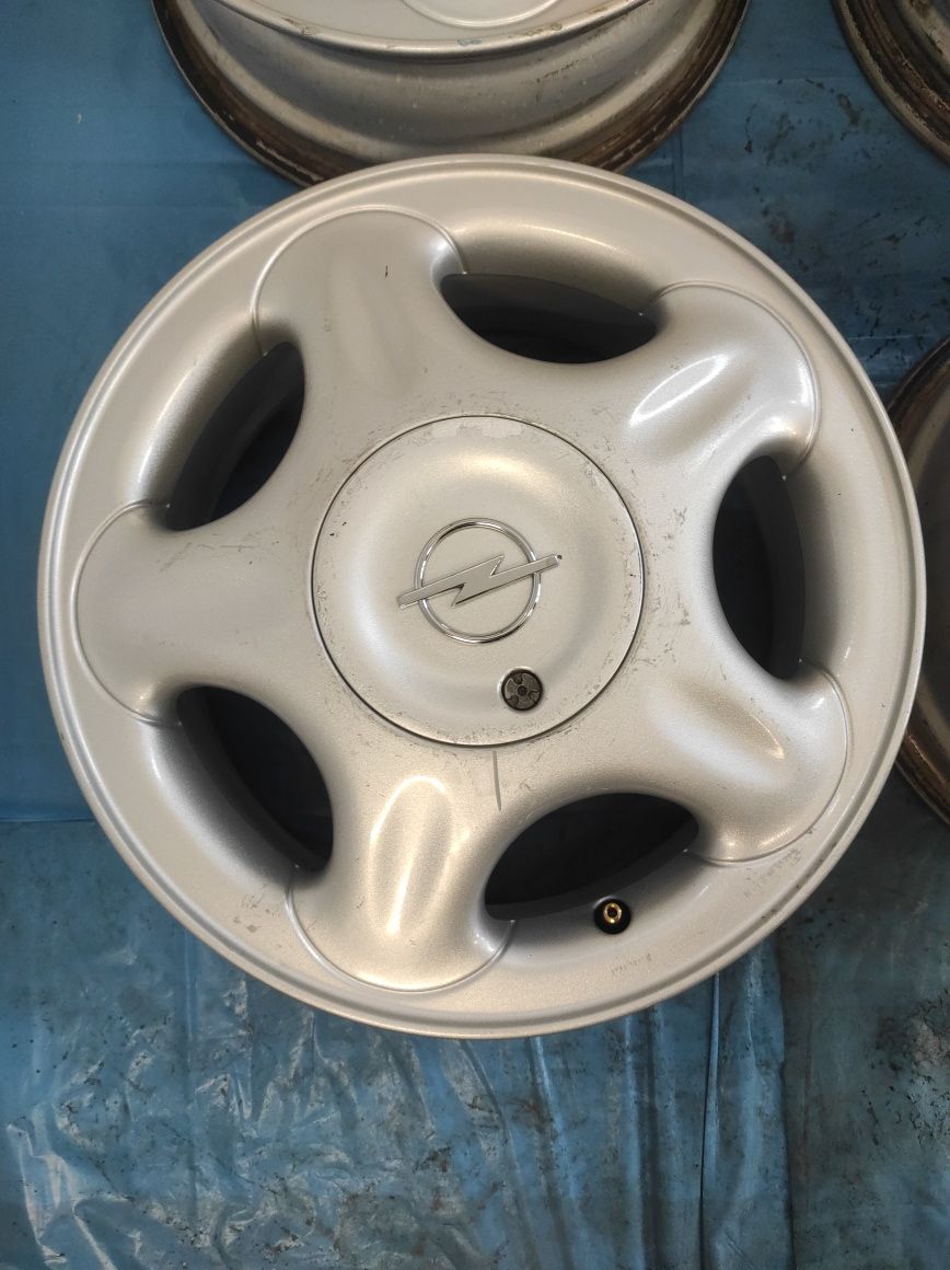 587 Felgi aluminiowe ORYGINAŁ OPEL R 14 4x100 otwór 56,6 mm